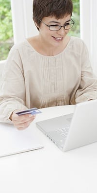 woman-with-cc-and-computer-cropped-web
