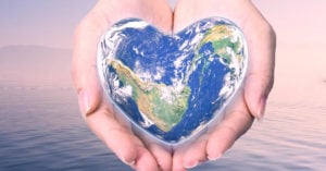 Heart-Shaped Globe in Cupped Hands