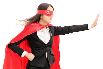 Female superhero making a stop sign with her hand