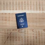 USA passport on wooden floor