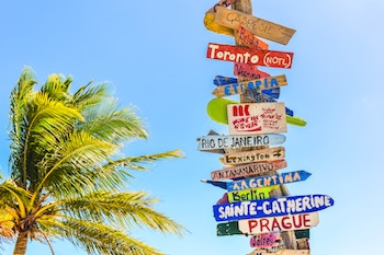 Signposts in a tropical scene