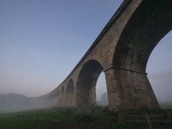 Old bridge extending overhead